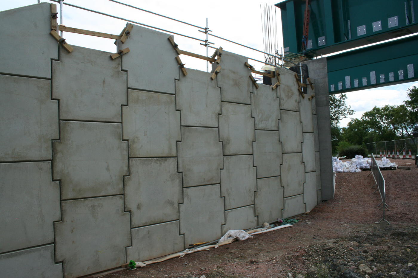 Concrete panel reinforced earth