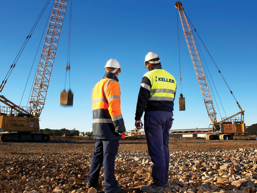 Two men discussing a Keller project on site