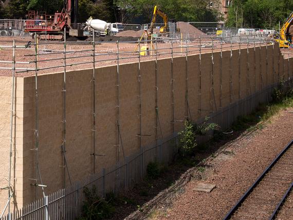 Modular block faced reinforced soil