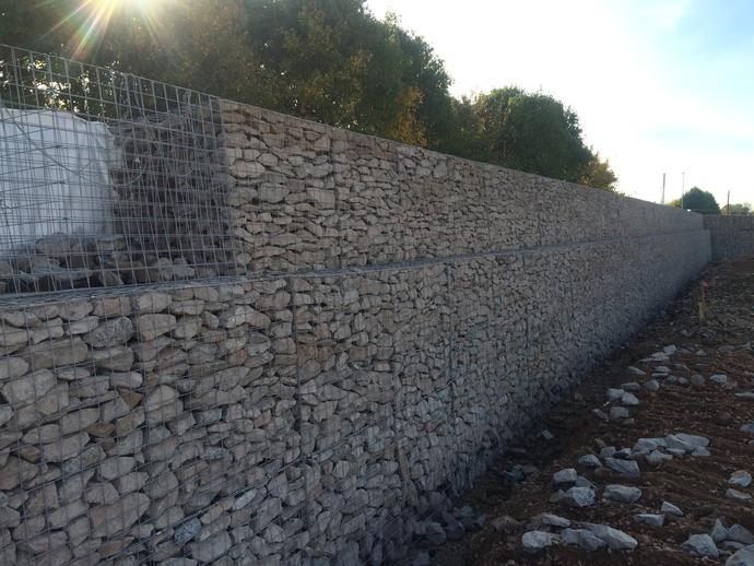 Gabion basket retaining wall